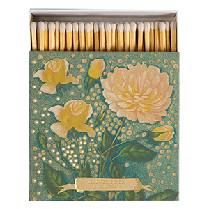Boîte décorative de 125 allumettes illustrée de roses jaunes sur fond turquoise avec détails en feuille d’or