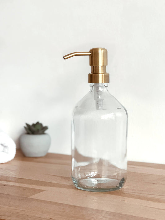 Flacon en verre transparent 250 ml avec pompe inox et laiton, vide et réutilisable
