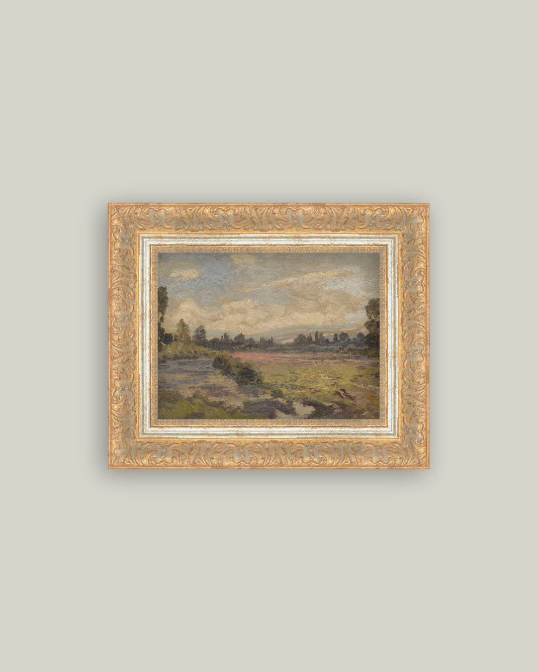 Tableau paysage champêtre sous un ciel nuageux avec cadre doré ancien