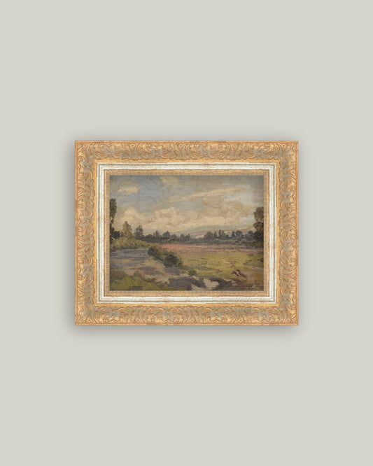 Tableau paysage champêtre sous un ciel nuageux avec cadre doré ancien